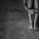 Black woman in handcuffs
